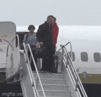 Tommy Tuberville Falling Down Plane Stairs