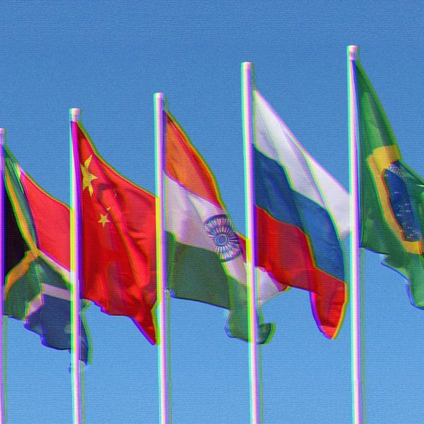 Founding BRICS nation flags waving in the air - South Africa, China, India, Russia and Brazil
