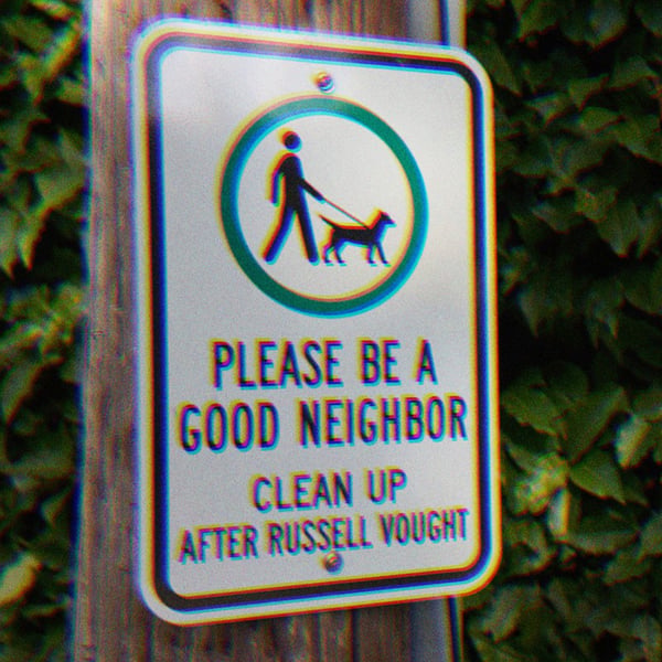 A metal sign on a pole in a park; An icon of a person walking a dog with text that reads, 'Please be a good neighbor. Clean up after Russell Vought.'