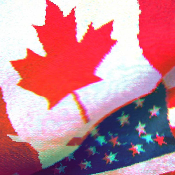 American and Canadian flags next to each other.