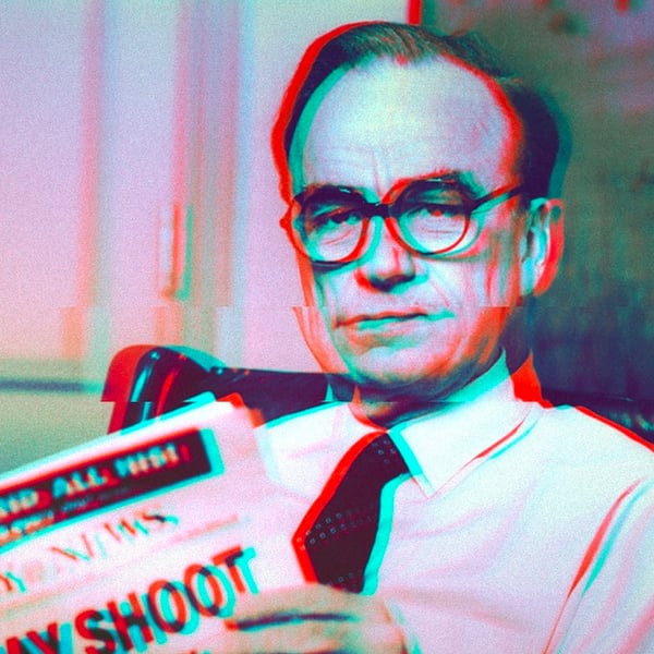 Old photo of Rupert Murdoch sitting in a chair holding a newspaper. A photo filter makes the image glitchy, with red and blue streaks clinging to the edges of Murdoch.