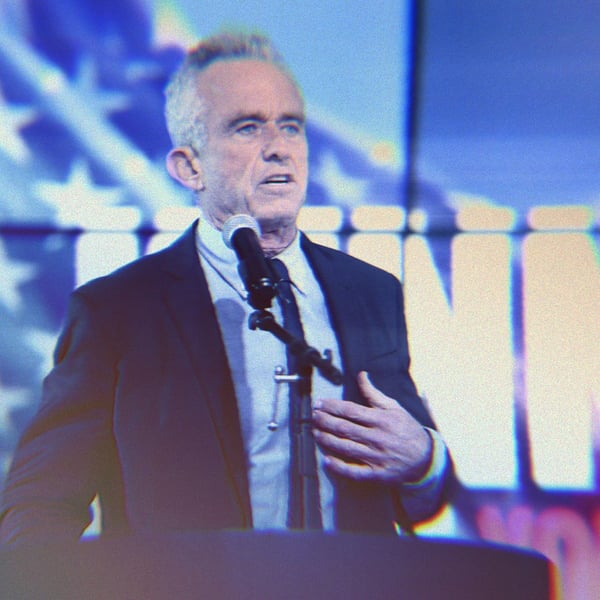 Robert F. Kennedy Jr. speaking at a podium.