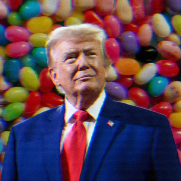 Trump staring forward, lips pursed almost smiling. Rainbow jelly beans are behind him, with one black bean in frame.