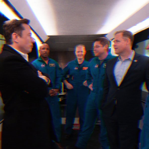 Elon Musk, NASA astronauts Victor Glover, Doug Hurley, Bob Behnken, Mike Hopkins, and NASA Administrator Jim Bridenstine inside the crew access arm with the SpaceX Crew Dragon spacecraft visible behind them during a tour of Launch Complex 39A before a 2019 launch of the Demo-1 mission at the Kennedy Space Center in Florida. 