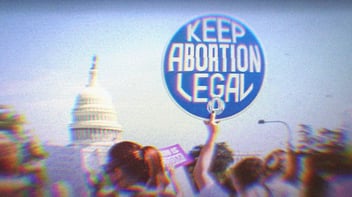 A pro-choice protest at the Capitol; the main focus of the image is a sign that says 'Keep Abortion Legal.'