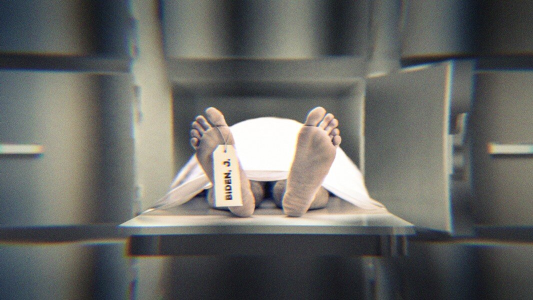 A body in a morgue locker. Feet are sticking out and a toe tag reads, Biden, J.