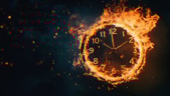 A rendering of a clock on fire. Flames engulf the rim and are beginning to spread inward towards the numbers.