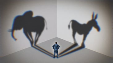 An illustration of a man with his back facing outward. He is staring at the wall, and two shadows come from him; an elephant and a donkey. Republican vs. Democrat concept.