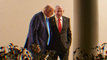 Donald Trump and Benjamin Netanyahu standing close together, talking.