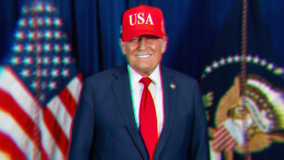 Donald Trump smiling evily wearing a red hat with USA in white letters