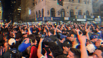 Knicks fans flood 7th Avenue in Manhattan after the team’s victory in game one of the NBA Finals against the Spurs.