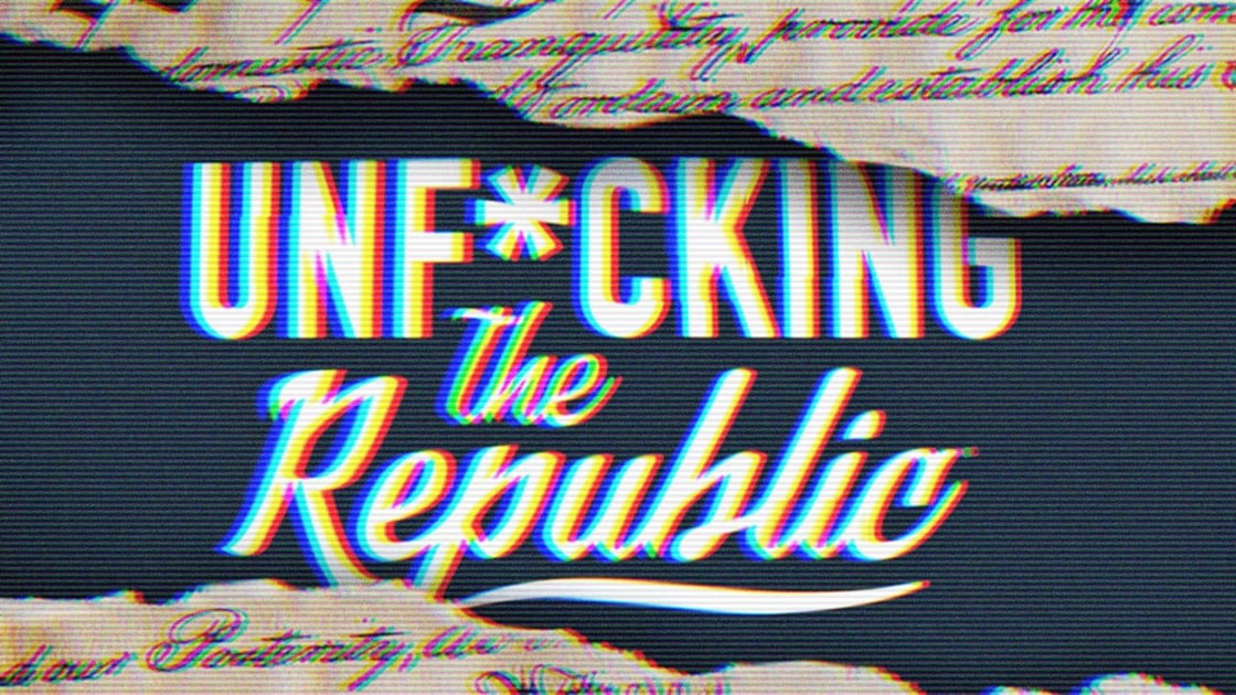 The US Constitution ripped in the middle revealing white text on a blue background that says, ‘Unf*cking the Republic.’ Letters have a glitchy rainbow effect on them.-Nov-16-2025-01-50-06-8156-AM