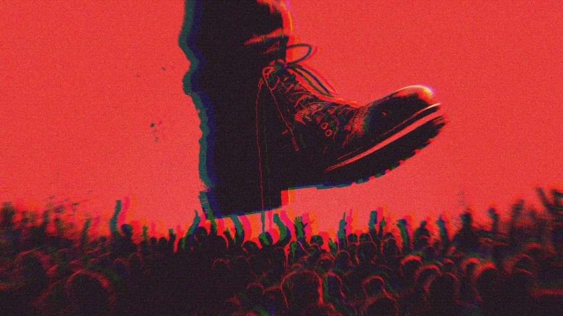 The boot of a dictator stomping the people protesting beneath him