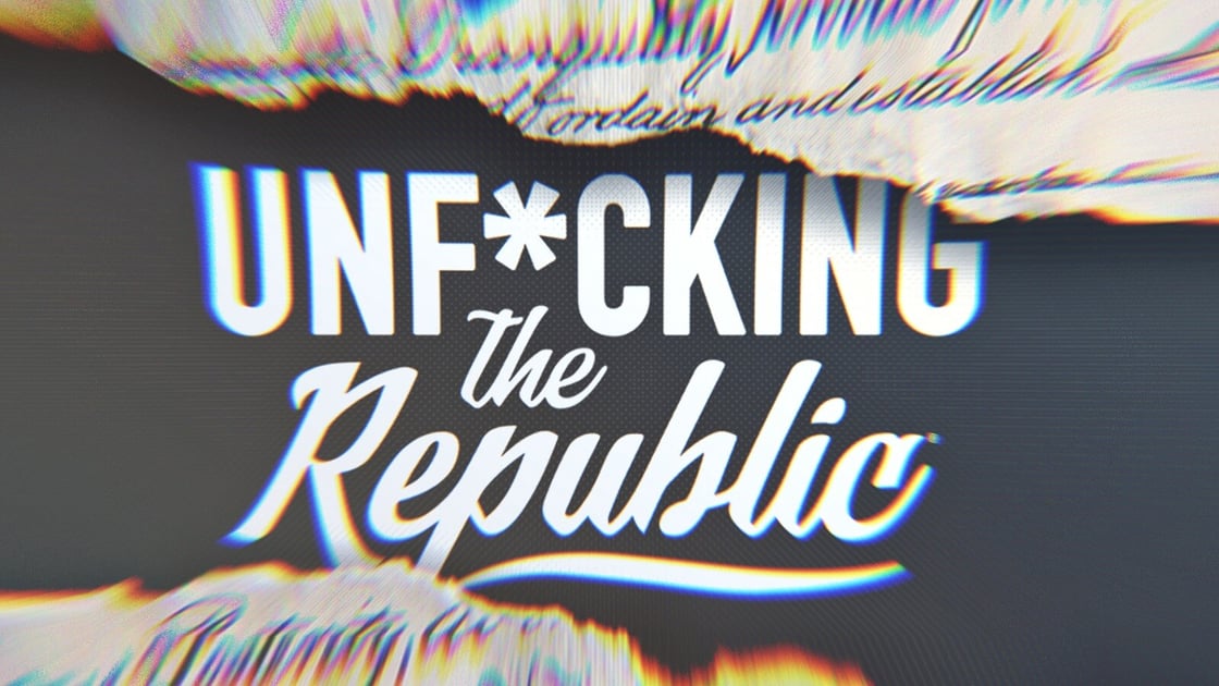The US Constitution ripped in the middle revealing white text on a blue background that says, ‘Unf*cking the Republic.’ Letters have a glitchy rainbow effect on them.