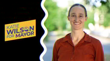 A photo of Katie Wilson alongside her campaign logo which reads, ‘Katie Wilson For Mayor.’