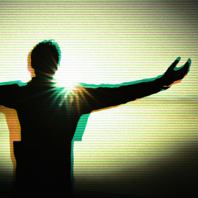 A person with their arms outstretched towards the sun. 