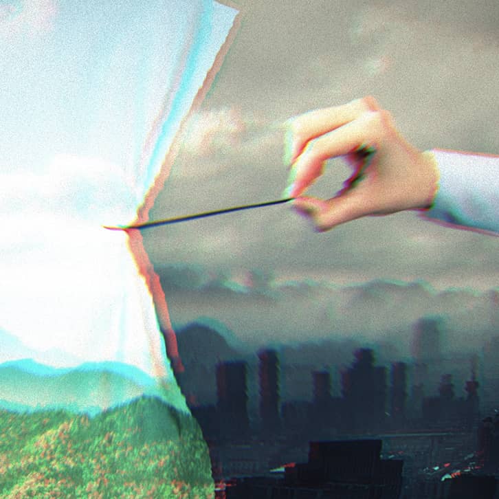 Someone pulling a curtain with image of mountains, green grass and nature over a grey, smoggy cityscape.