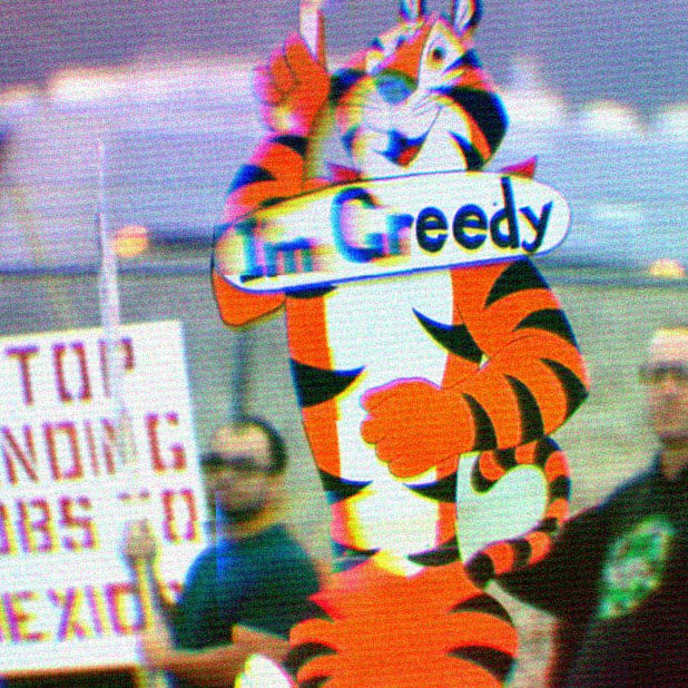 Kellogg's Strikers holding signs. Main sign in focus is Tony the Tiger saying 'I'm Greedy.'