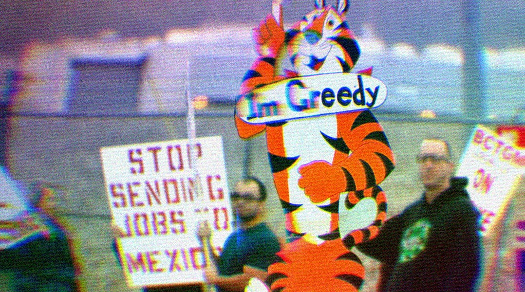 Kellogg's strikers holding signs. Main sign in focus is Tony the Tiger, saying 
