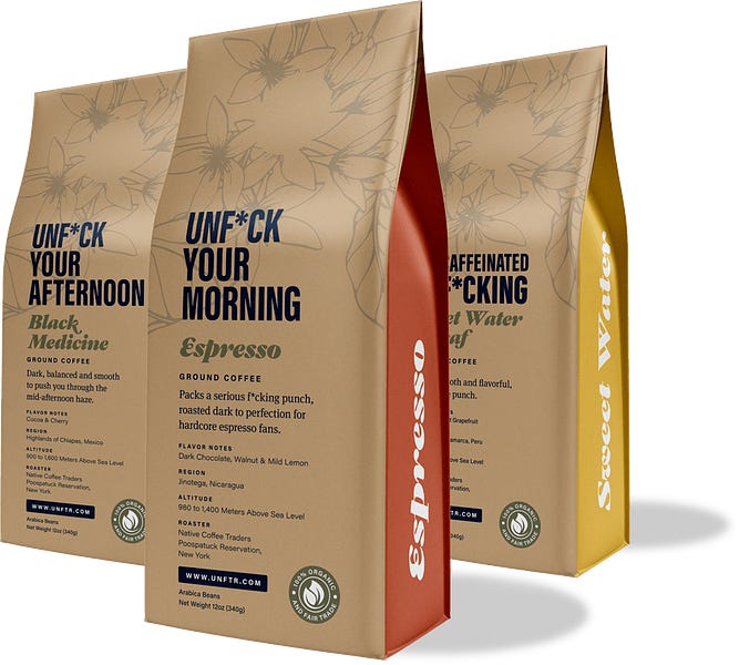 Unf*cking Coffee bags lined up. From left to right, the blends are: Unf*ck Your Afternoon, Unf*ck Your Morning and A Decaffeinated Unf*cking.