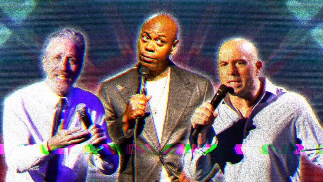 Composite image of Jon Stewart, Dave Chappelle and Joe Rogan. All are standing, holding microphones, mid-speech. 