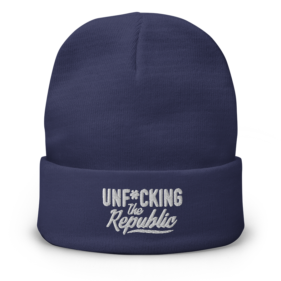 Navy cuffed beanie with white embroidered logo that says ‘Unf_cking The Republic’