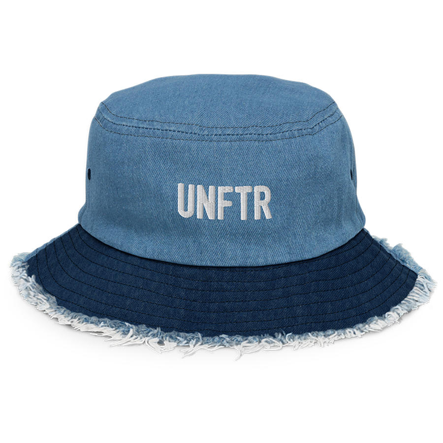 Two toned denim bucket hat with white embroidered logo that says UNFTR