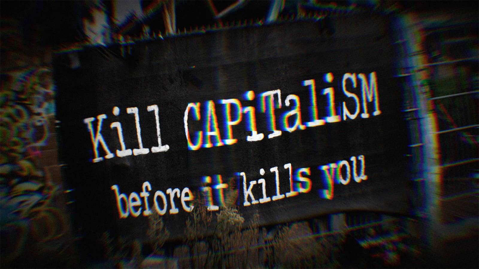 A Banner that says' Kill Capitalism Before It Kills You'