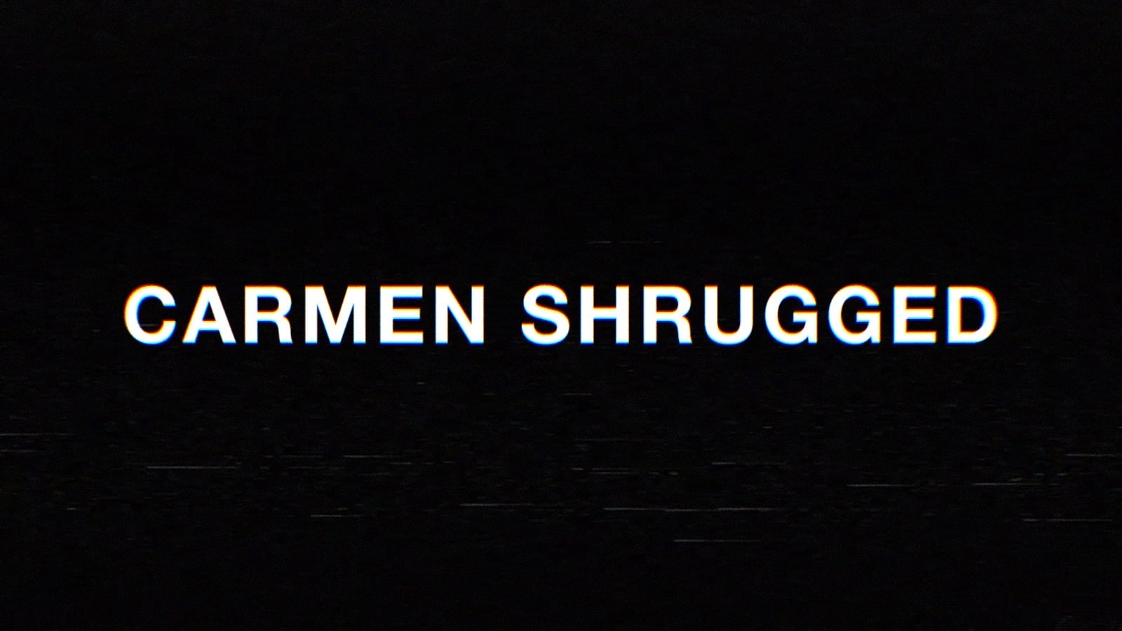 White text on a black background that reads, ‘Carmen Shrugged.’