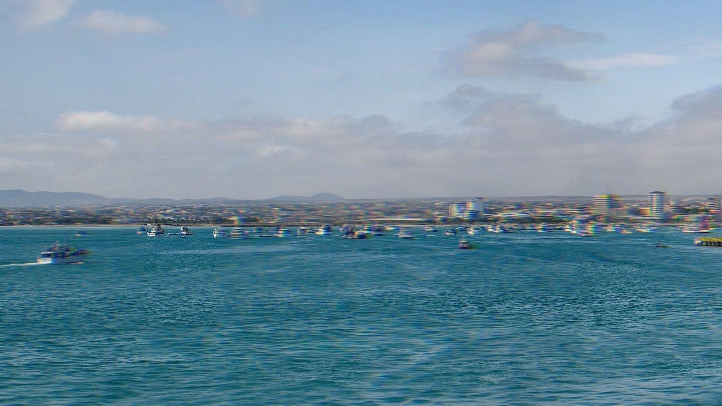 Wide view of the city of Mantua, Ecuador taken from the sea.